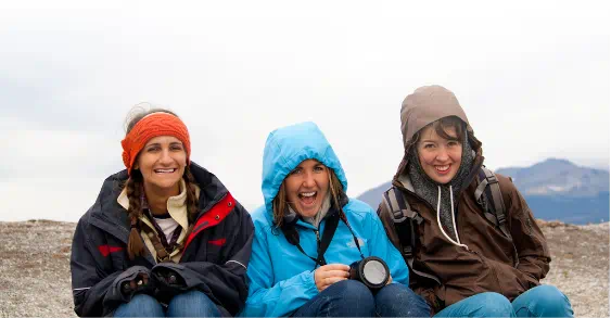 Three women international travelers.